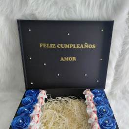 Handmade ribbon-rose box with chocolates and a personalized message.