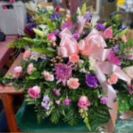 Pink Sherbet Casket Spray With Bow