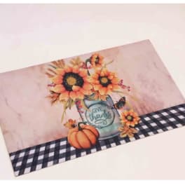 Fall-themed sign with sunflowers, pumpkins, and a "Give Thanks" jar design