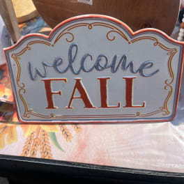 Decorative sign reading "welcome FALL"