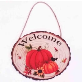 Round hanging sign with pumpkins and the word Welcome