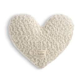 Heart-shaped knitted pillow in cream with a small label