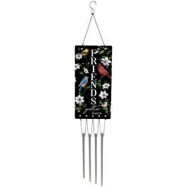 Hanging wind chime with birds and white flowers on a black panel