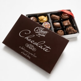 Box of assorted chocolates with the lid partially open