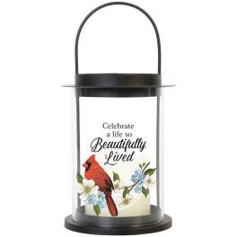Black lantern with a memorial message and cardinal floral design