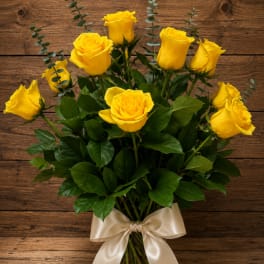 Bouquet of yellow roses tied with a satin ribbon