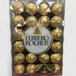 Box of Ferrero Rocher chocolates in gold wrappers