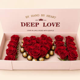 Heart-shaped red rose box with chocolates in a pink gift box