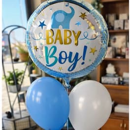 Baby boy balloon bouquet with blue and white balloons
