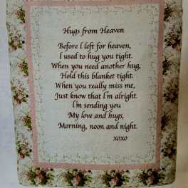 Floral blanket with a memorial poem printed in the center