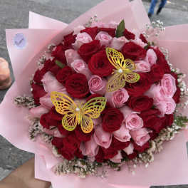 ramo bouchon de rosa y maripoza By Special Moment´S