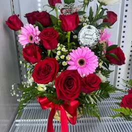 canasta de rosas y gerber By Special Moment´S