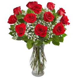 Medium bouquet of red roses with white filler flowers arranged in a clear glass vase