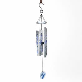 Hanging metal wind chime with blue floral accents and a round pendant