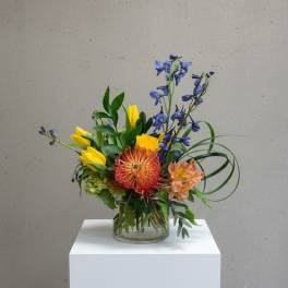 Colorful mixed bouquet in a clear glass vase