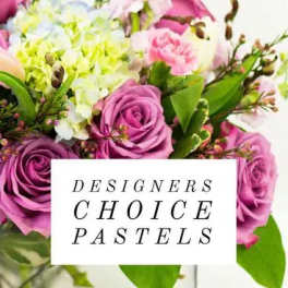 Pastel bouquet with pink and purple roses and pale hydrangeas