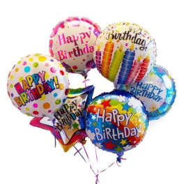 Cluster of colorful birthday balloons with printed messages
