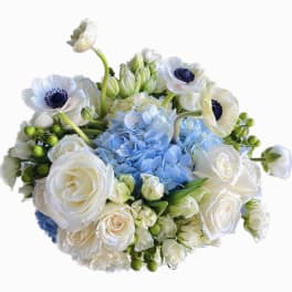 White and blue bouquet with roses, hydrangea, and anemones
