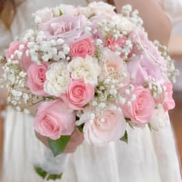 Pink and white rose bouquet with baby's breath