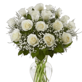 White roses and calla lilies in a clear glass vase