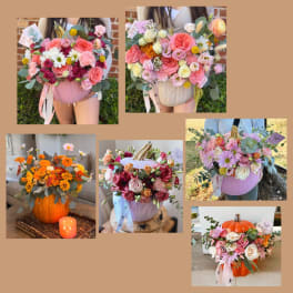 Pumpkins filled with mixed flowers in pink, white, and orange
