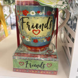 Decorative mug gift set with "Friends" text and floral patterns