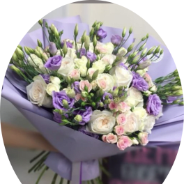 Lavender-wrapped bouquet of white and purple flowers
