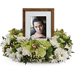 White and green floral photo frame tribute arrangement