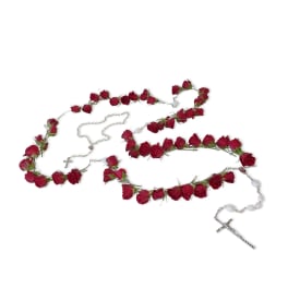 Rosary necklaces decorated with red roses on a white background