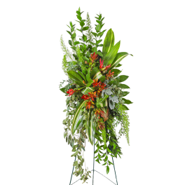 Tall tropical floral standing spray with red-orange blooms and mixed greenery