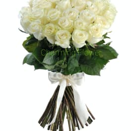 Two Dozen White/ Cream Roses. In a vase.