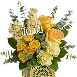 Yellow roses and cream flowers in a decorative gift box with a "thanks" sign