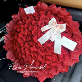100 red roses with red layered wrap