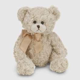 Cream-colored teddy bear with a satin bow