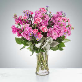 Pink mixed bouquet in a clear glass vase