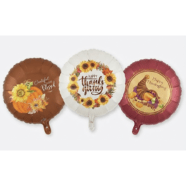 Three round Thanksgiving foil balloons with autumn designs