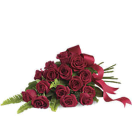 Bouquet of deep red roses with a ribbon bow