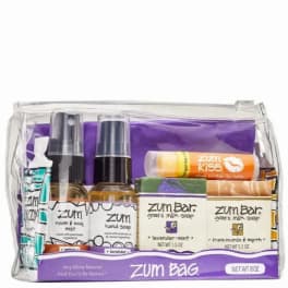 Clear toiletry bag with Zum soap and body care items inside