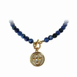 Blue beaded necklace with a gold circular pendant