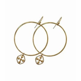 Pair of gold hoop earrings with small dangling charms