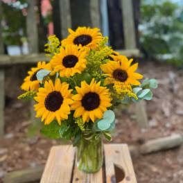 Sunflower bouquet in a clear glass vase