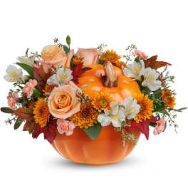 Pumpkin-shaped arrangement with peach roses, white alstroemeria, and orange mums