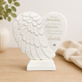 White angel wing heart memorial plaque on a small base