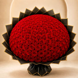 Large dome bouquet of red roses with black wrapping