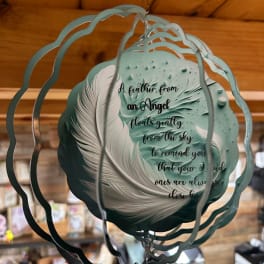 Teal memorial balloon with feather design and printed sympathy message