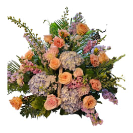 Pastel bouquet with roses, hydrangeas, and mixed blooms