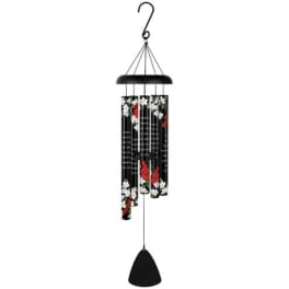 Black wind chime with floral-printed tubes and a hanging clapper
