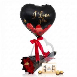 Heart-shaped balloon with a red rose bouquet and chocolates