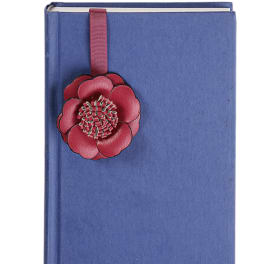 Blue book with a red flower bookmark ribbon