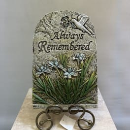 Decorative memorial plaque with a bird, flowers, and the words "Always Remembered"